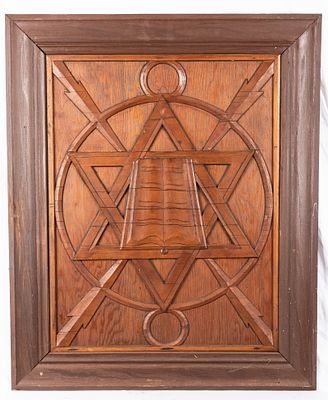 A HAND CARVED WOODEN JEWISH STAR. Probably American, c. 1920. With lightning bolts flashing and 