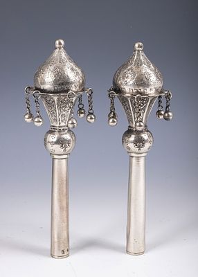 33. A PAIR OF SILVER TORAH FINIALS. Persian, 20th century. Traditional form. Engraved with 