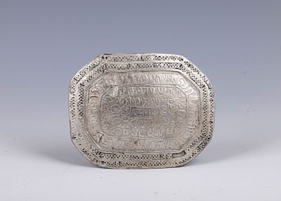 44. A SILVER AMULET. Probably Iraq or Morocco, c. 1900. With a filigree border and kabbalistic 