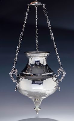 A MONUMENTAL SILVER ETERNAL LIGHT. Egypt, c. 1932-3. Traditional form with three rococo 