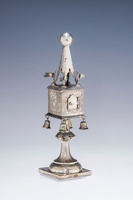 A SILVER SPICE TOWER. Poland, c. 1820. On a square base with an engraved knobbed stem that 