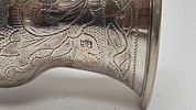 A SILVER KIDDUSH GOBLET. Vilna, 1879. On a stylized base with knobbed stem and skirted תמונה - 2
