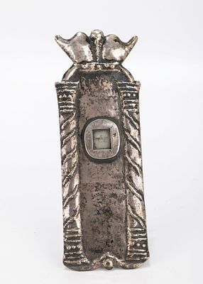 A SILVER MEZUZAH CASE. Probably Poland. Decorated with two pillars and a crown. With the window