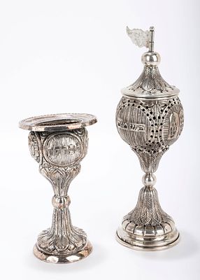 A SILVER HAVDALLAH SET. Hungarian, c. 1920. Each chased with repousee bodies. Includes a spice.