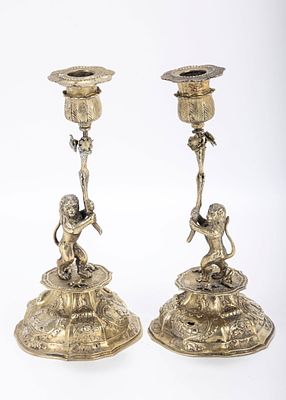 A PAIR OF SILVER JUDAIC SABBATH CANDLESTICKS. In German style, 20th century. A pair of silver