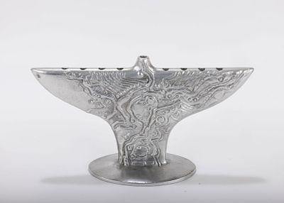 A LARGE ALUMINUM MENORAH SCULPTURE BY DON DRUMM (American, b. 1935). A ALUMINUM MENORAH 