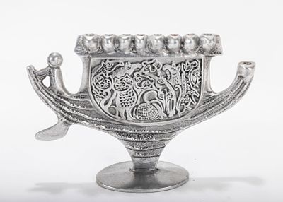 AN ALUMINUM MENORAH SCULPTURE BY DON DRUMM (American, b. 1935). A ALUMINUM MENORAH SCULPTURE BY 