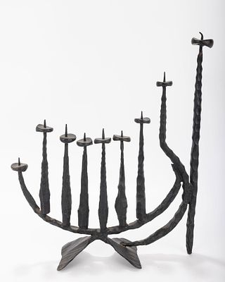 A LARGE CHANUKAH MENORAH BY DAVID PALOMBO (1920 - 1966). Israel. Black metal in stylized 