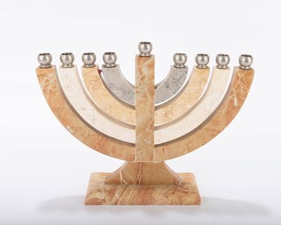 A LARGE JERUSALEM STONE MENORAH. Israel, 20th century On a rectangular base with inserted metal 