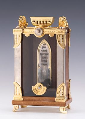 SWED MASTER SILVERSMITHS. (Jerusalem, c.2000) SILVER AND WOOD CHARITY CONTAINER. On four 