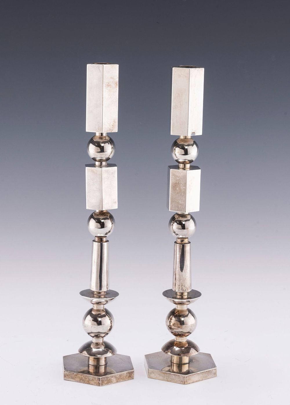 CARMEL SHABI (1939 - Israel, 2009). SABBATH CANDLESTICKS. Each on an octagon base with a 
