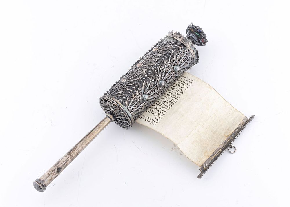 A SILVER FILIGREE MEGILLAH CASE WITH THE ORIGINAL MEGILLAH. Probably Italy, c. 1880. On a thin 