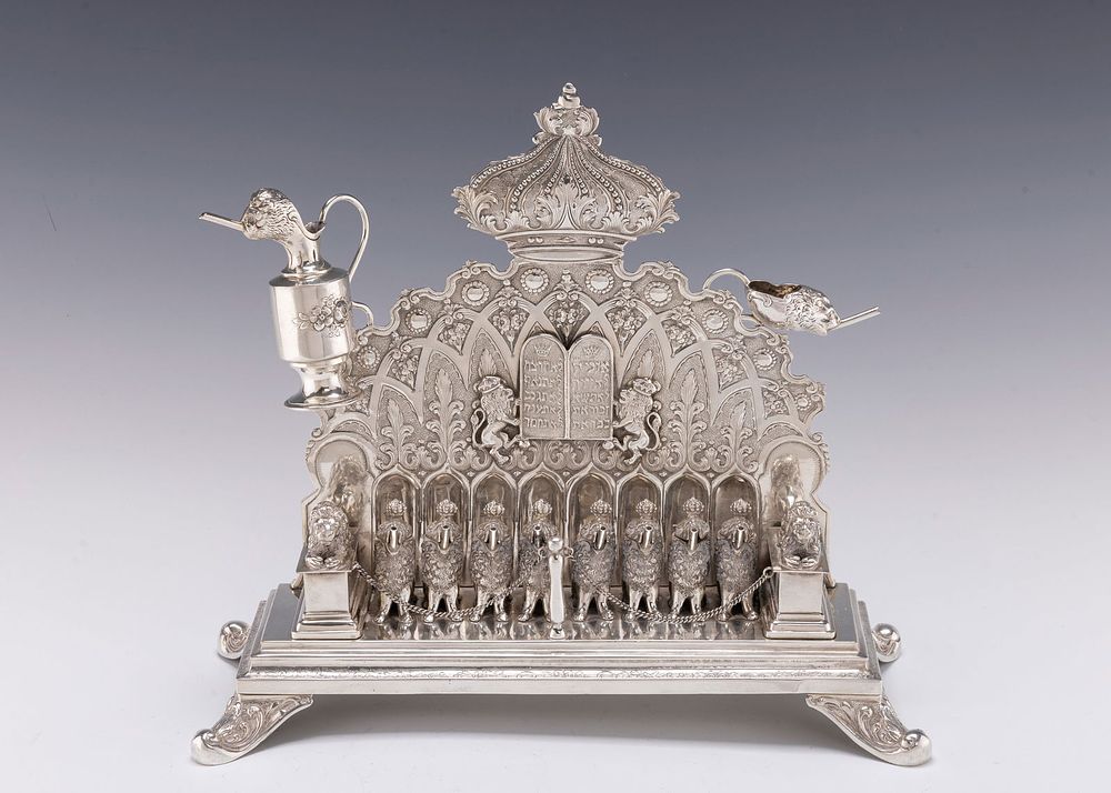 A LARGE SILVER HANUKKAH LAMP. Germany, c. 1920. Probably Hanau. Exceptional crisp quality. On 