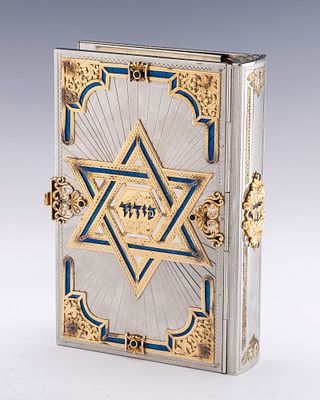 A STERLING SILVER, ENAMEL AND GILDED IDF SIDDUR BINDING BY YAAKOV DAVIDOFF. A STERLING SILVER 