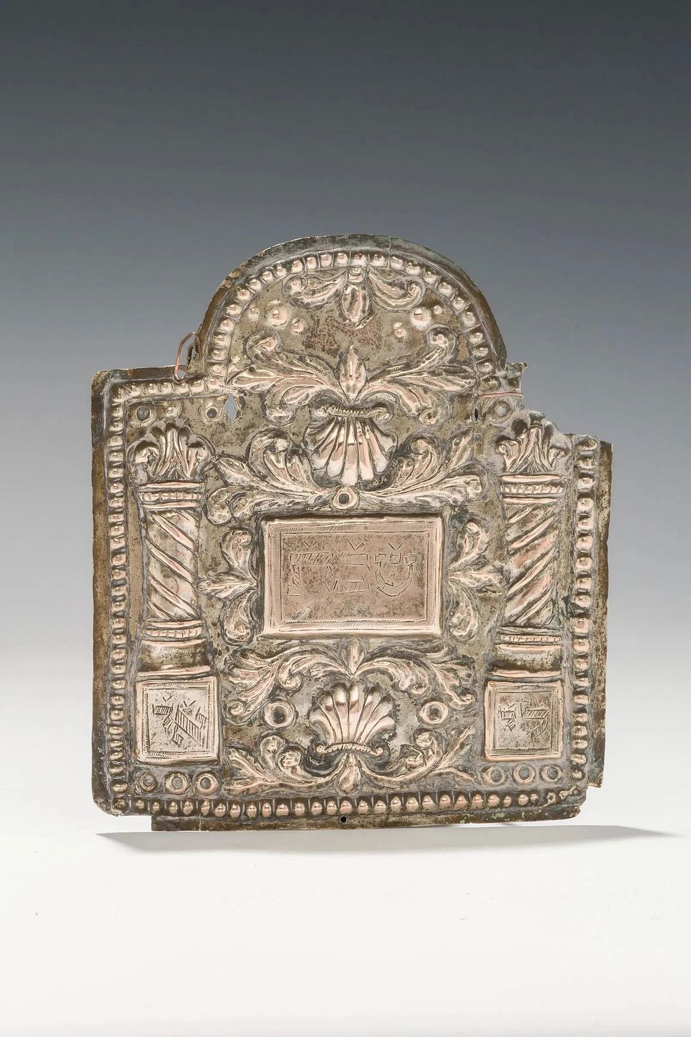 AN EARLY SILVER TORAH SHIELD. Eastern Europe/Poland. Poland, 18th century. Decorated with two 