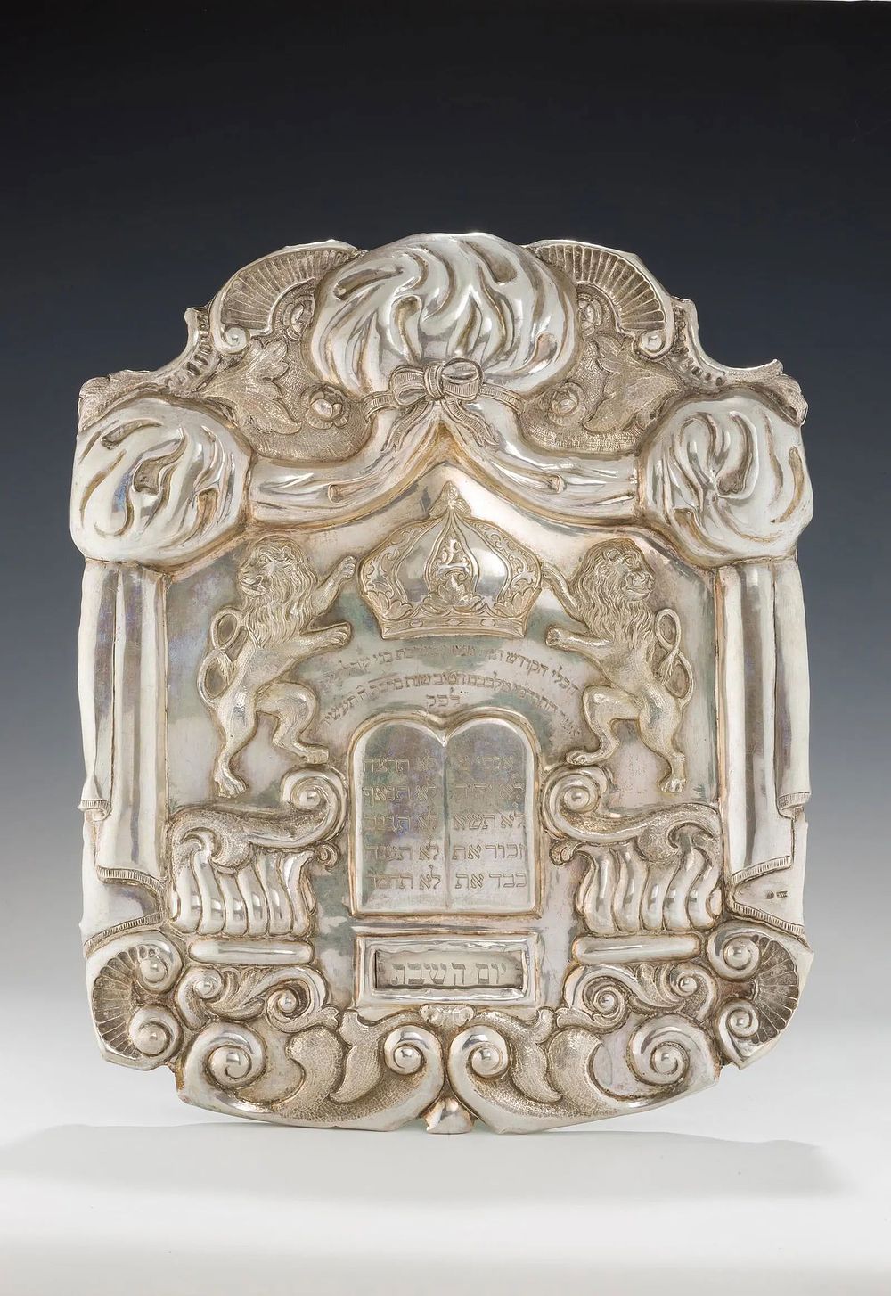 A MONUMENTAL SILVER TORAH SHIELD. Vienna, 1856. Hand chased with scrolling designs, a Decalogue 