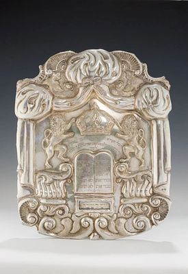 A MONUMENTAL SILVER TORAH SHIELD. Vienna, 1856. Hand chased with scrolling designs, a Decalogue 