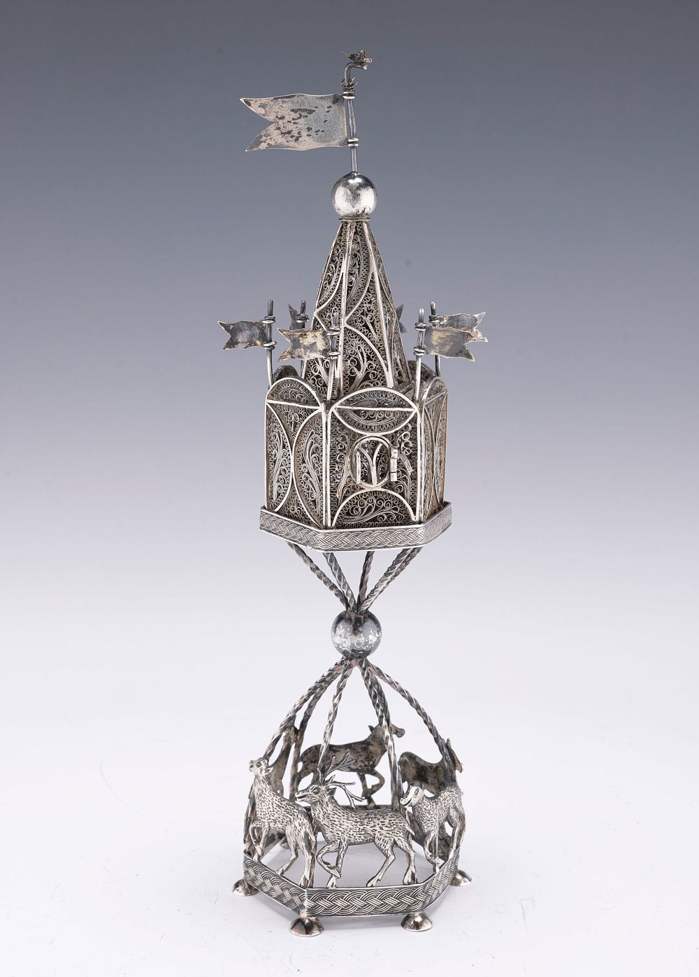 A LARGE SILVER SPICE CONTAINER. Poland, c. 1840. On a hexagonal base that is fitted with hand 