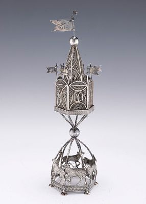 A LARGE SILVER SPICE CONTAINER. Poland, c. 1840. On a hexagonal base that is fitted with hand 