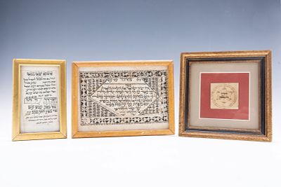 A GROUP OF THREE AMULETS. Morocco, 19th century. The two smaller ones are on Parchement, filled 