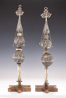 A PAIR OF SILVER TORAH FINIALS. Djerba, Tunisia, 19th century. On round bases with tubular 