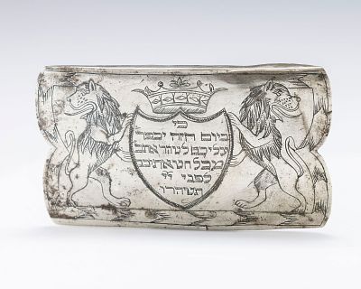 AN EARLY GALICIAN SILVER YOM KIPPUR BUCKLE. Eastern Europe, c. 1800. Rectangular. With central 