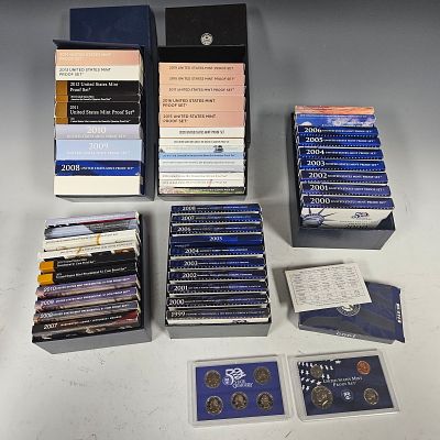 A COLLECTION FOR 44 MINT PROOF SETS AND TEN SETS OF THE STATE QUARTERS. 	All in mint condition, in o