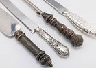 TWO STERLING HANDLE CHALLAH KNIFES, A CAKE SERVER AND A LIGHTER. Modern. Consisting of stainless Image - 1