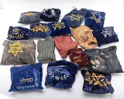 A COLLECTION OF 17 PAIRS OF TEFILLIN. A collection of 17 pairs of used tefillin. Not sold as kosher.