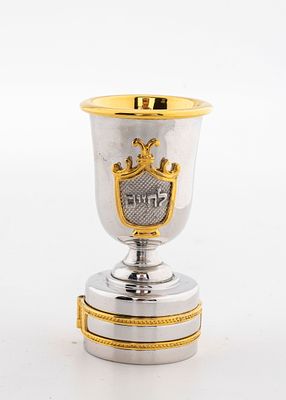 A WHISKEY BOTTLE STOPPER BY SWED MASTER SILVERSMITHS. Shaped like a wine cup. Signed. Rhodium 