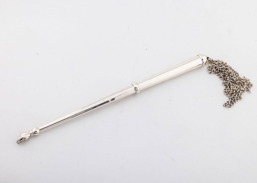 A SILVER TORAH POINTER. Germany, 19th century. Narrowing as it tapers towards the hand portion. 