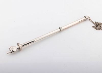 A SILVER TORAH POINTER. Germany, 19th century. Narrowing as it tapers towards the cuffed hand 