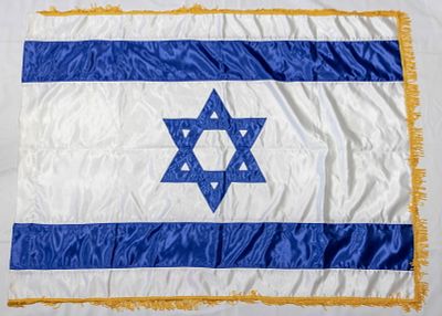 A LARGE UNUSED ISRAELI FLAG. c, 1980. Traditional. For indoor use. 88" x 60"