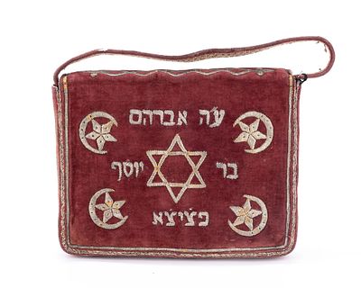 AN EMBRODERED TALLIS BAG. Ottoman Empire, c. 1900. The body is made of red velvet with gold 