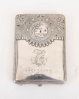 A RARE BEZALEL CIGARETTE CASE. Jerusalem, c. 1929. Decorated with applied wirework and a plaque 