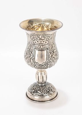 A SILVER KIDDUSH GOBLET. Portugal, c. 1990. Traditional form with chased grapevine leaf design. 