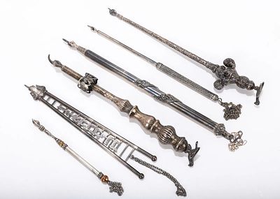 A GROUP OF SIX SILVER TORAH POINTERS. Israel and USA, 20th century. The longest is 11 inches long