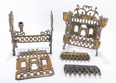 TWO BRASS CHANUKAH LAMPS Poland, 19th and 20th centuries Two examples of the wooden synagogue 