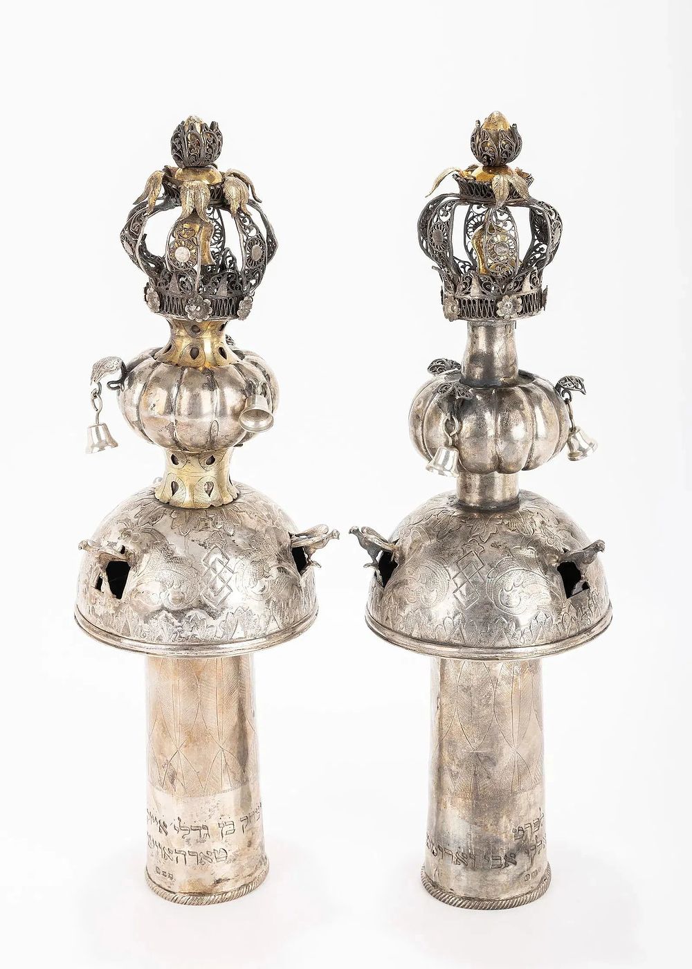 A PAIR OF EARLY AND LARGE SILVER TORAH FINIALS. Ukraine, c. 1860. On large staves with a domed 