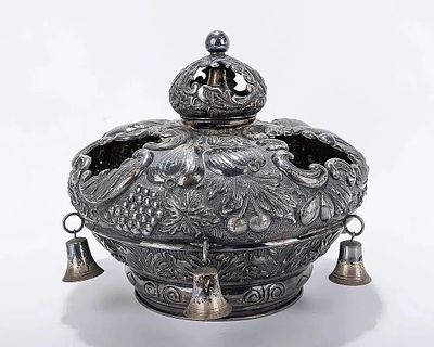 A SILVER TORAH CROWN. Hungarian, 20th century. Chased with fruits, scrolls and other organic 