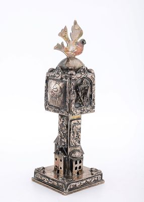 A SILVER SPICE CONTAINER BY ELI GERA. Hand crafted. Decorated with a small house base, flowers 