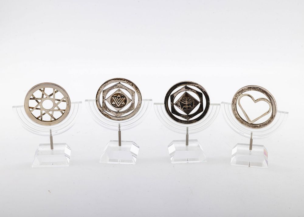 FOUR STERLING SILVER DECORATIVE KINETIC MEDALS. Israel, c. 2000. By Naim Basson. Each one 