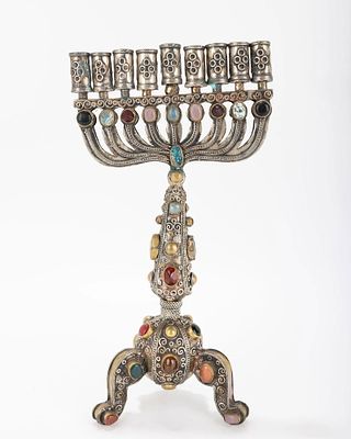 A LARGE HANUKKAH MENORAH. Probably Israel, Modern. With a gilded body and applied stones, metal 