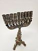 A LARGE HANUKKAH MENORAH. Probably Israel, Modern. With a gilded body and applied stones, metal תמונה - 10