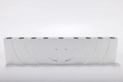 AN ALUMINUM HANUKKAH MENORAH BY ZELIG SEGAL 1933-2015 . Israel. AN ALUMINUM HANUKKAH MENORAH BY 