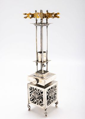 A MONUMENTAL STERLING SILVER HAVDALAH COMPENDIUM. On four stylized feet with a lattice work main 