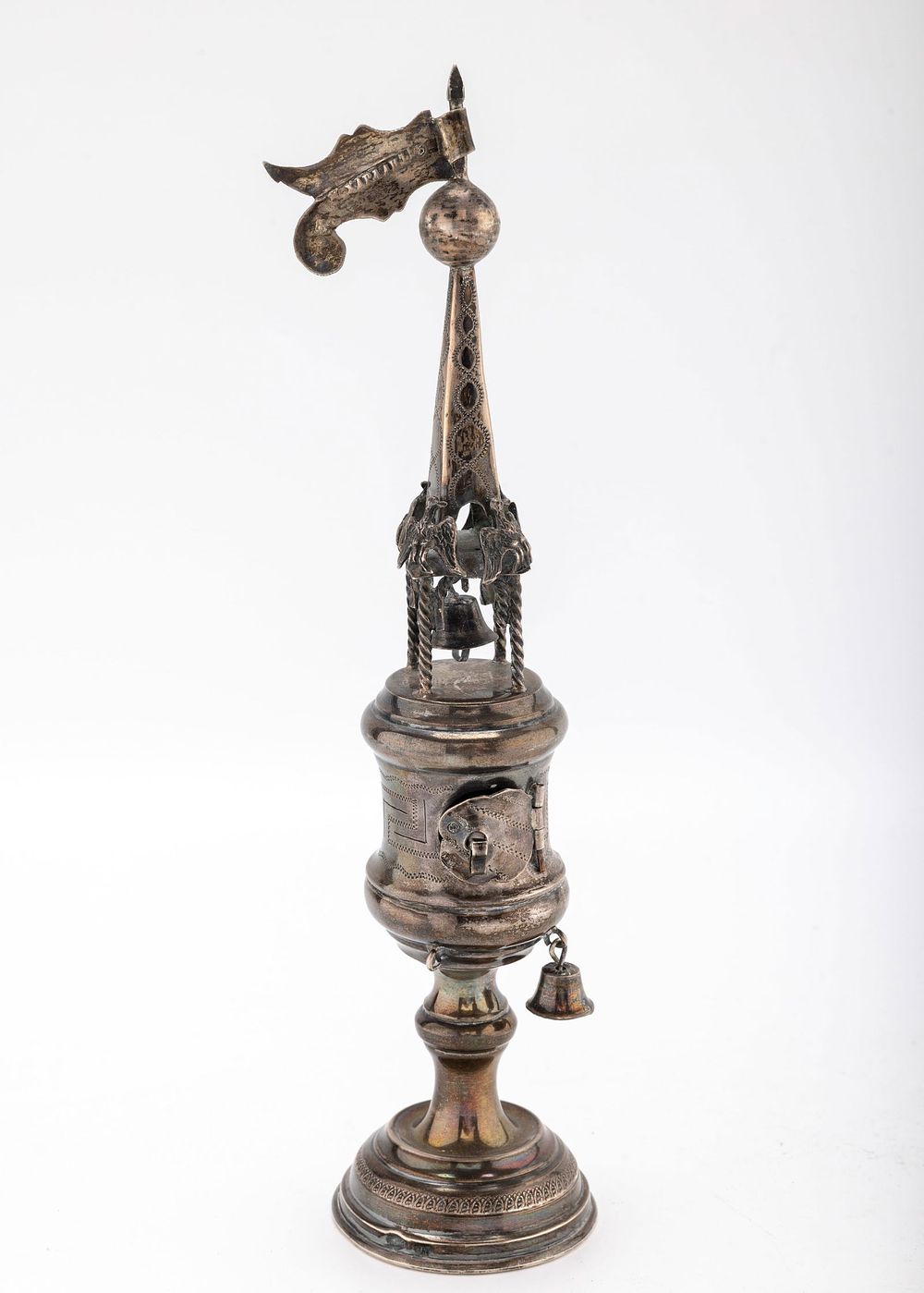 A LARGE SILVER SPICE TOWER BY M. KHARLOP. Warsaw, c.1890. On a round base and of spool form. 