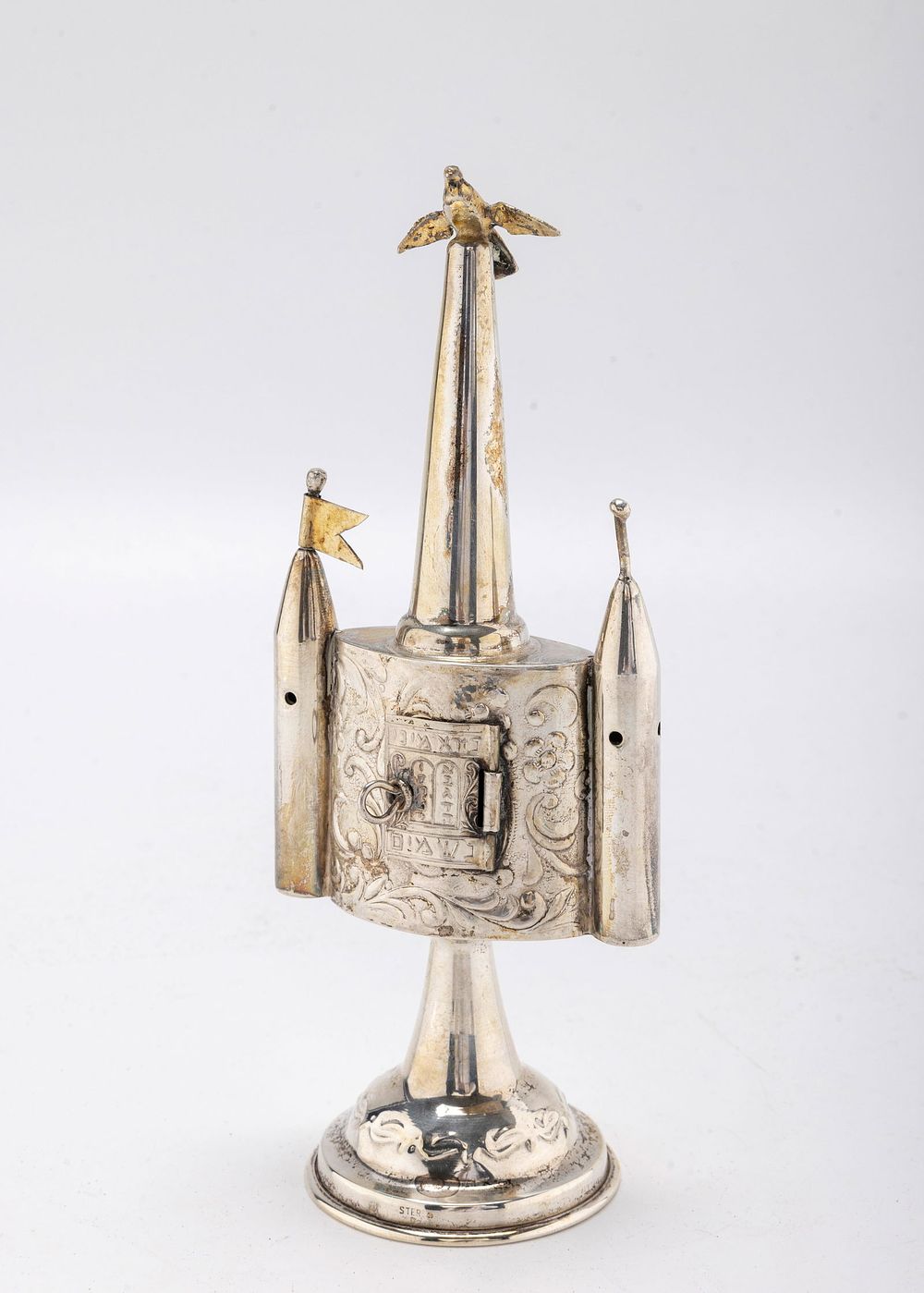 A STERLING SILVER SPICE TOWER. Israel, c. 1990. On a domed round base with a castle shaped main 