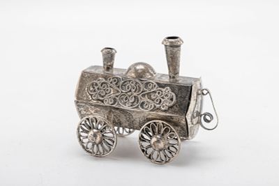 A STERLING SILVER SPICE CONTAINER. Probably Israel. In the shape of a small antique locomotive. 