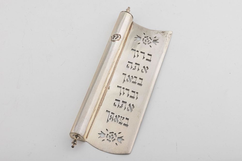 A LARGE STERLING SILVER MEZUZAH CASE. Probably Israel, modern. The body is tubular in shape. 